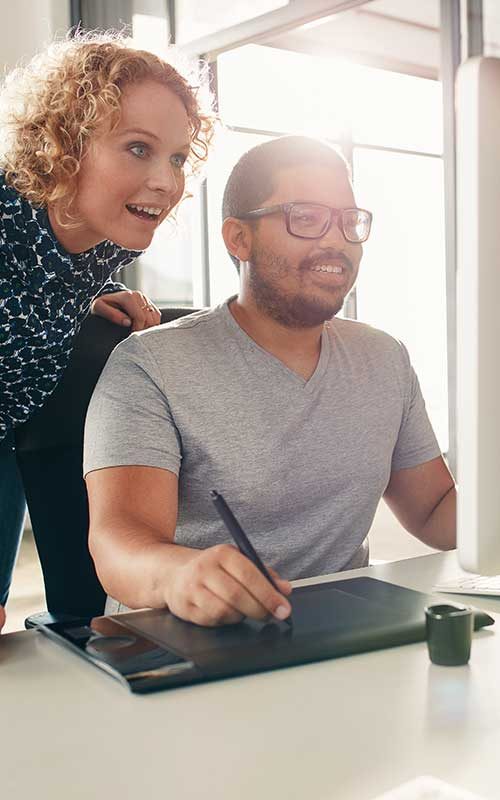 Web designers working on PC